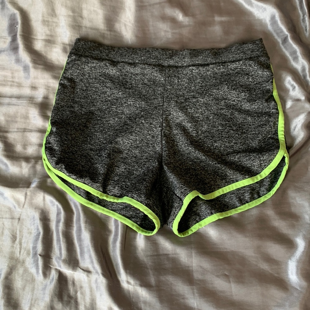 Grey workout shorts with neon green stripes